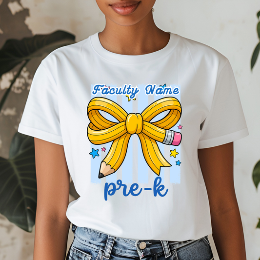 A woman wearing a white graphic t-shirt with a yellow ribbon bow, pencil, and blue text reading 'Faculty Name pre-k'.