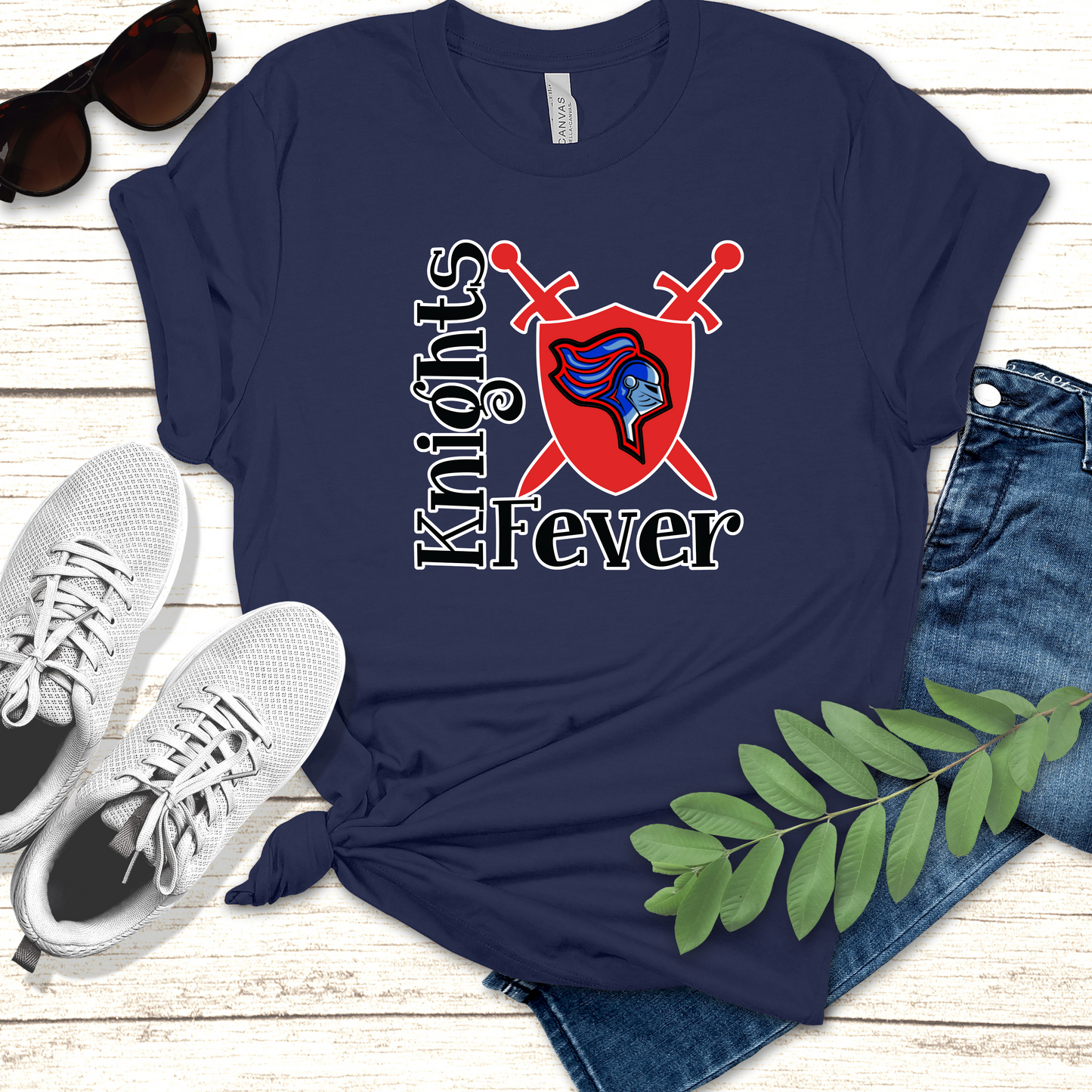 Navy blue t-shirt with 'Knights Fever' design on a wooden surface with shoes and jeans. Knights School Spirit Shirt - Knights Fever - Rep the Knights Tee