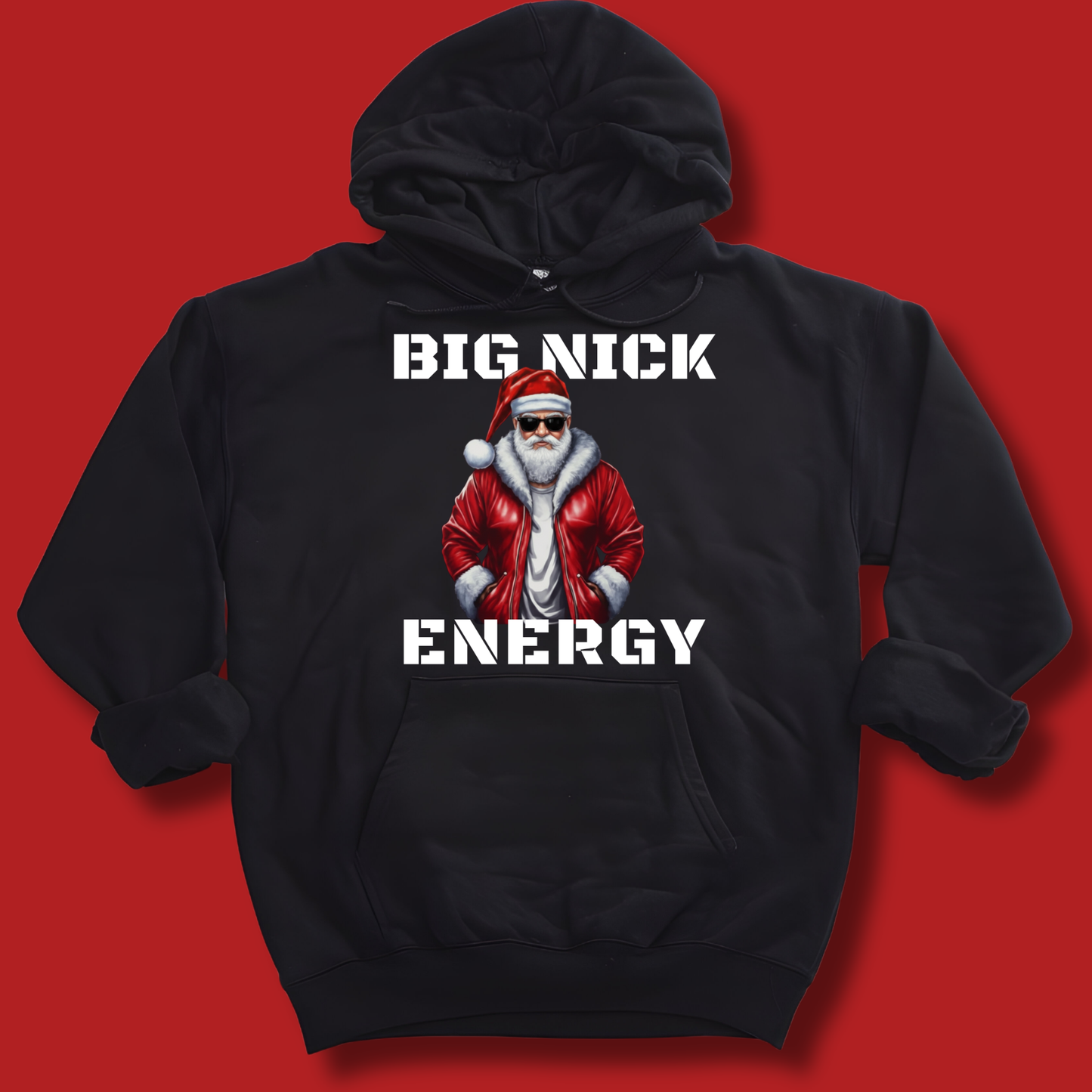 Black hoodie with a graphic of a person in a red jacket and Santa hat, text 'BIG NICK ENERGY' on a red background.