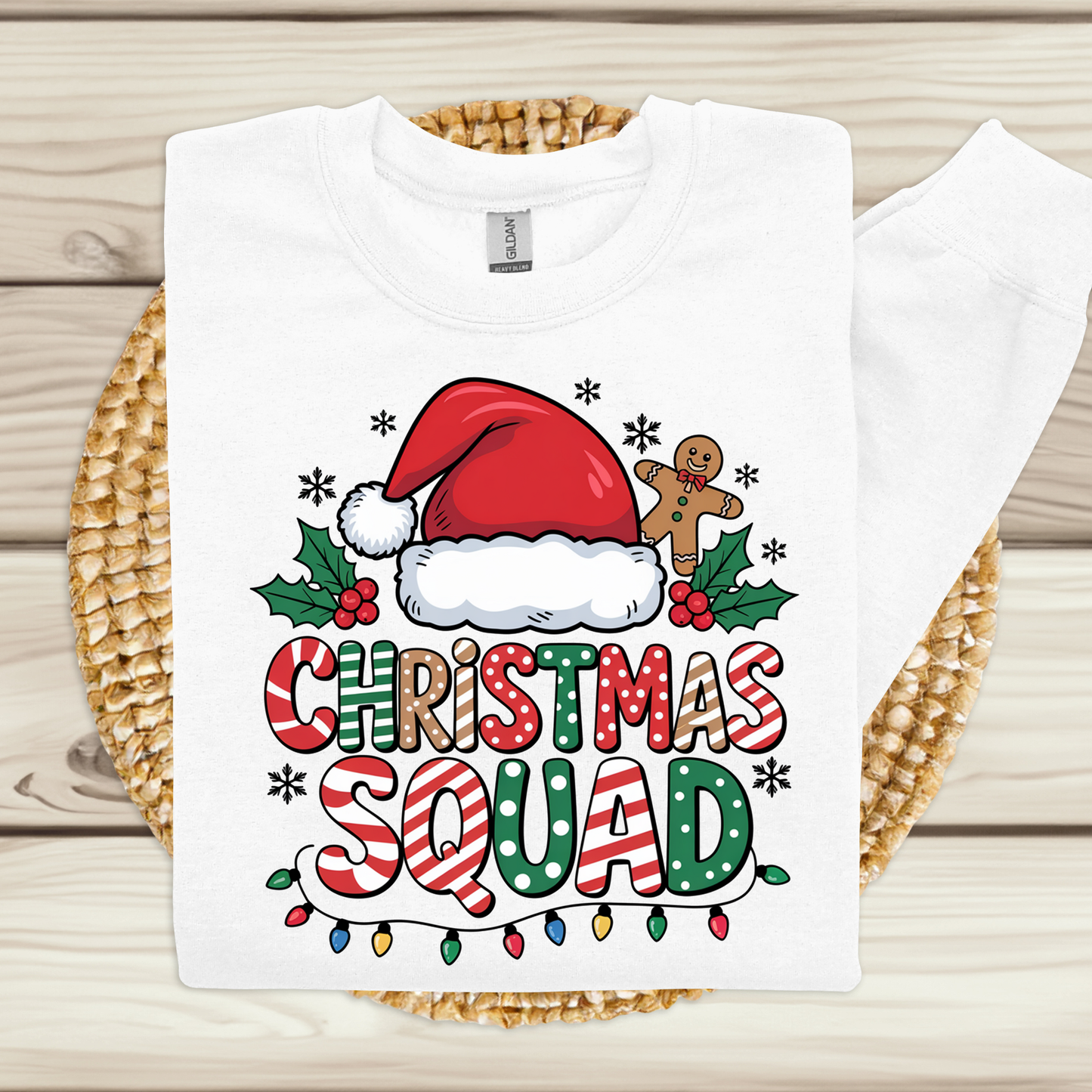 White t-shirt with 'Christmas Squad' design featuring a Santa hat, candy cane, and holly on a woven mat. Matching Family Christmas Squad Shirt - Christmas Squad Family Matching T-Shirt