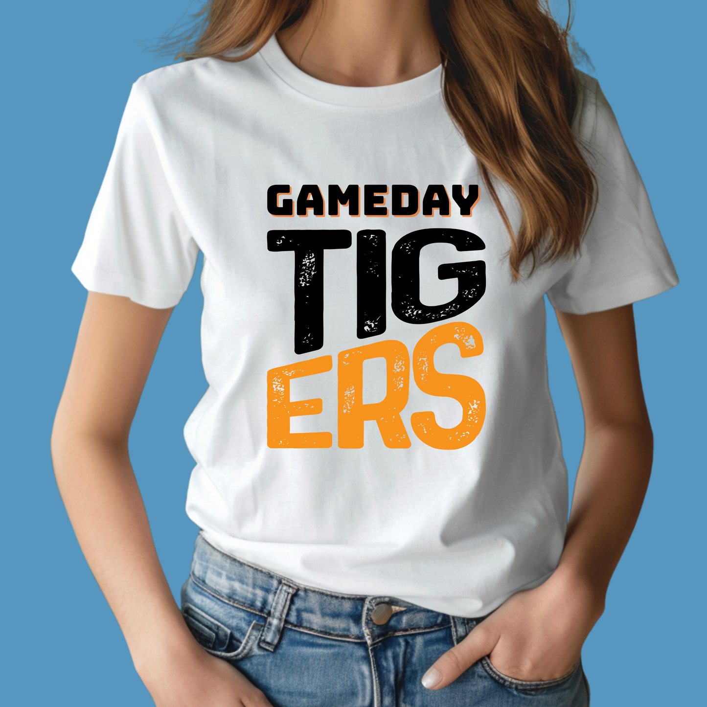 Person wearing a white t-shirt with 'GAMEDAY TIGERS' text on a blue background, Custom Mascot Shirt - Game Day Tigers - School Spirit Tee Shirt