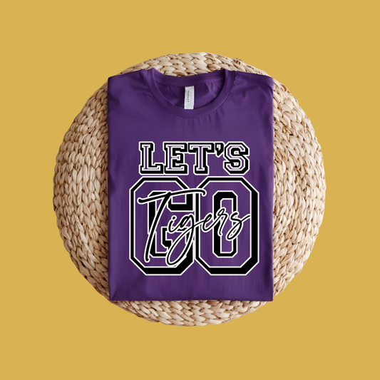 Purple t-shirt with 'LET'S GO Tigers' text on a woven mat with a yellow background, Custom Mascot Shirt - Let's Go Tigers Game Day Spirit Wear