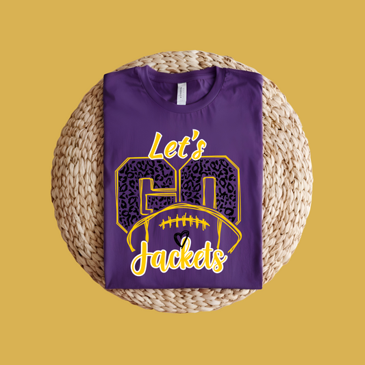 Purple t-shirt with 'Let's Go Jackets' design on a woven surface with yellow background Custom Mascot Shirt - Lets Go Jackets Game Day Cool Spirit Tee