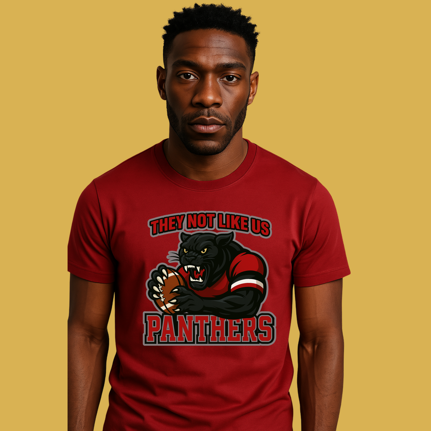 Man wearing a red t-shirt with a panther graphic and text on a yellow background Custom Mascot Shirt - Panthers They Not Like Us Game Day Wear