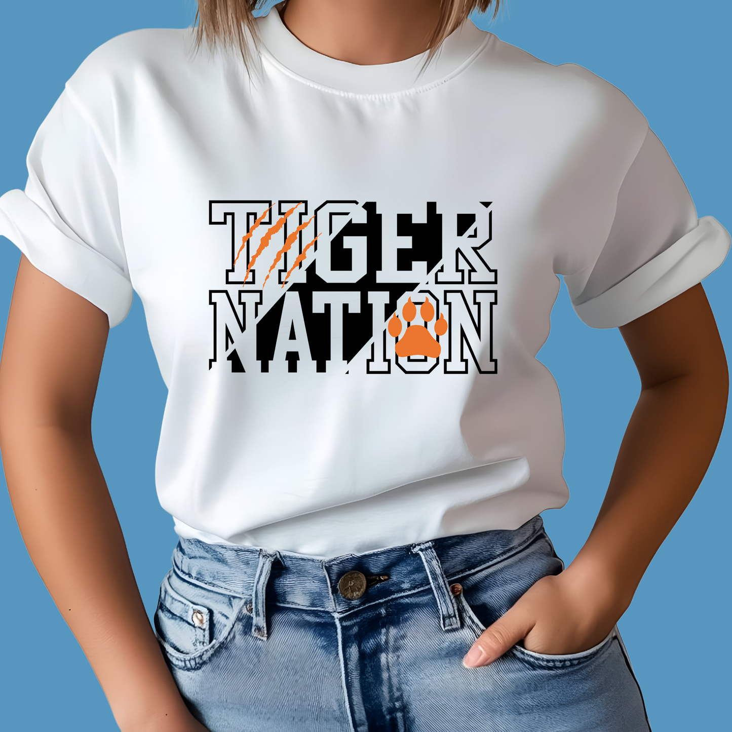 Person wearing a white t-shirt with 'Tiger Nation' design on a blue background - Custom Mascot Shirt - Tiger Nation - School Spirit Tee Shirt