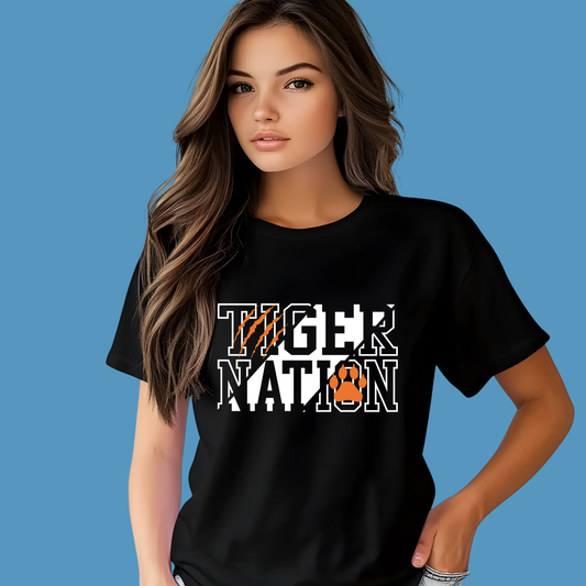 Woman wearing a black t-shirt with 'Tiger Nation' text on a blue background - Custom Mascot Shirt - Tiger Nation - School Spirit Tee Shirt