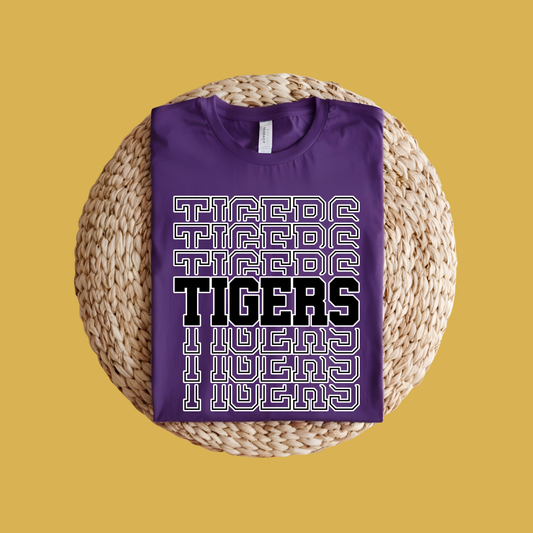 Purple t-shirt with 'TIGERS' text on a woven surface and yellow background Custom Mascot Shirt - Tigers Pride Game Day Cool School Spirit Tee