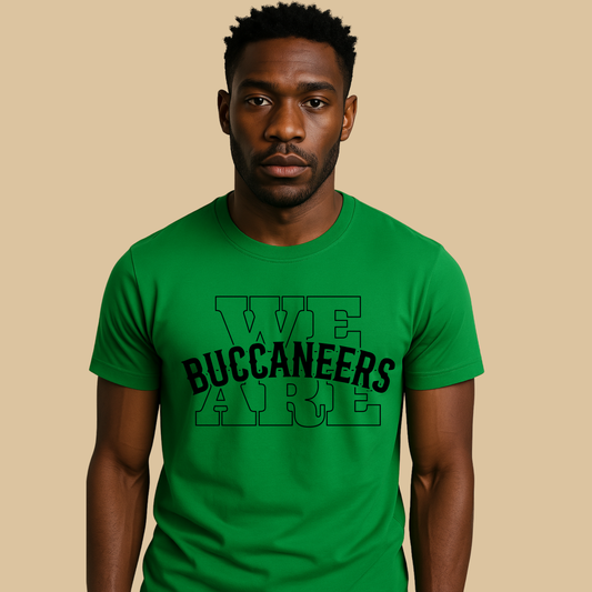 Man wearing a green t-shirt with 'WE BUCANEERS ARE' text on a beige background Custom Mascot Shirt - We Are Buccaneers School Spirit Tee
