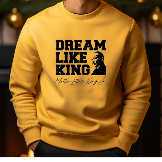 Black men wearing a black sweatshirt with the phrase "DREAM LIKE KING" and an image of Martin Luther King Jr., celebrating Black heritage and empowerment for MLK Birthday Celebration and holiday