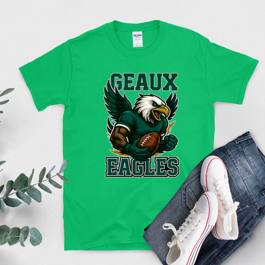 Green t-shirt with eagle graphic and 'GEAUX EAGLES' text, paired with jeans and sneakers on a light background. Eagles Mascot Shirt - Geaux Eagles Game Day Team Spirit Shirt