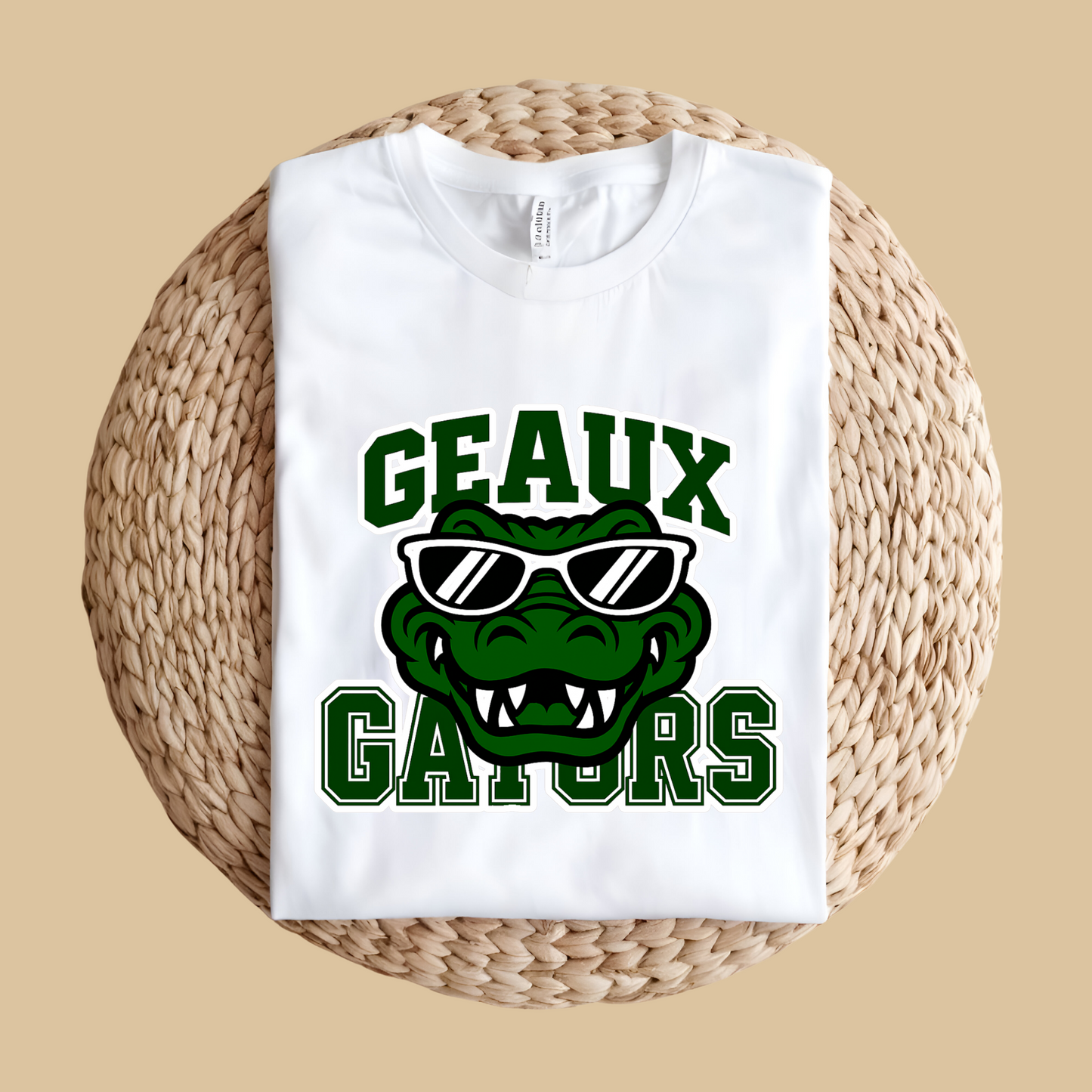 White sweatshirt with 'Geaux Gators' design featuring an alligator wearing sunglasses on a woven surface. Gators Mascot Shirt - Geaux Gators Game Day Mascot Shirt
