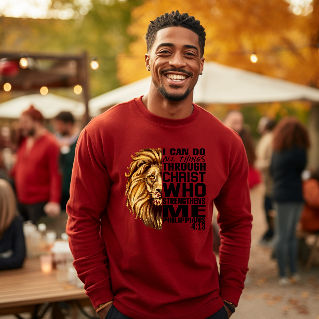 Lion Crewneck Sweater – I Can Do All Things Through Christ Sweater Man wearing a Garnet Red Christian faith sweater with "I can do all things through Christ who strengthens me" and Lion of Judah design. Inspirational Christian and Christian Faith Sweater along with a Lion of Judah
