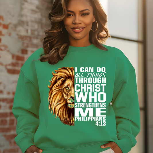 Lion Christian Sweatshirt "I Can Do All Things Through Christ" Unisex Women wearing a green Christian faith sweater with "I can do all things through Christ who strengthens me" and Lion of Judah design. Inspirational Christian sweatshirt