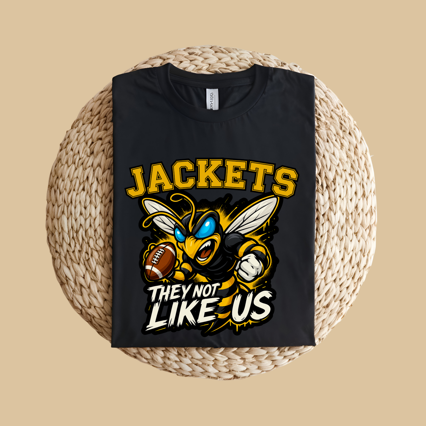 Black t-shirt with a bee graphic and text on a woven surface Jackets Mascot Shirt - Bold Yellow Jacket They Not Like Us Game Day Tee