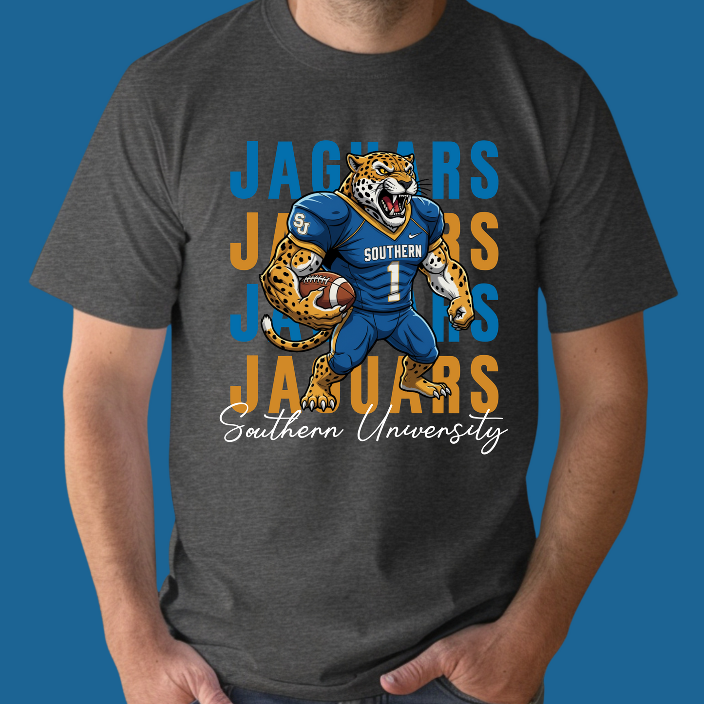 Person wearing a dark gray t-shirt with a Jaguars graphic design on a blue background Southern Jaguars T-Shirt – Southern University Game Day & Homecoming Graphic Tee