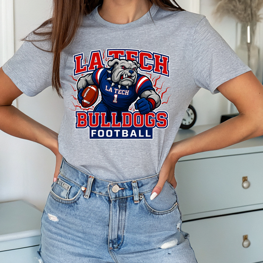 Person wearing a gray t-shirt with 'La Tech Bulldogs Football' graphic design. LA TECH Bulldogs Football T-Shirt - Fierce Louisiana Tech Bulldogs Game Day Tee