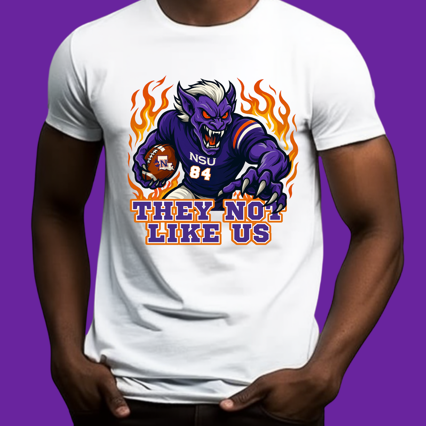 White t-shirt with a graphic of a purple creature holding a football and text 'THEY NOT LIKE US' on a purple background. Northwestern Demons Game Day T-Shirt - Demons "They Not Like Us" Football Tee