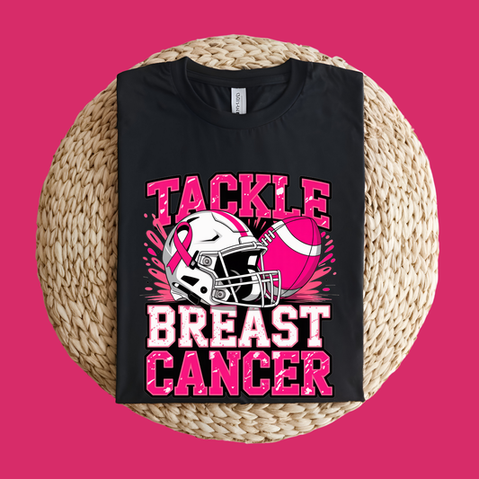 Black t-shirt with 'Tackle Breast Cancer' design featuring a football helmet and pink ribbon on a pink background. Pink Ribbon Tee: Tackle Breast Cancer Support Football T-Shirt
