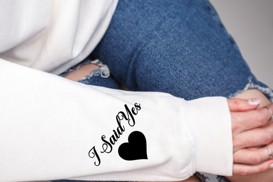Women's White Sweatshirt with Future Mrs. to indicate engagement Announcement keepsake sweater for the bride to be in addition to a perfect engagement gift at the bridal, a personalized wedding shirt with I said yes on the sleeve
