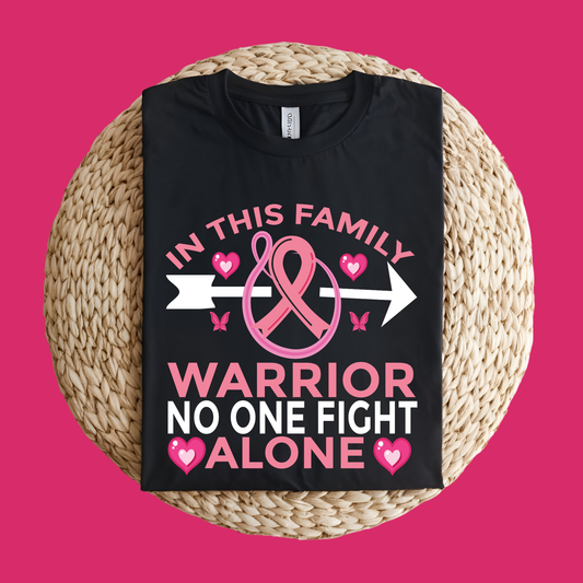 Black t-shirt with pink breast cancer awareness design on a pink background Pink Ribbon T-Shirt: Warriors Wear Pink Support Awareness Tee Pink Ribbon T-Shirt: In This Family No One Fight Alone Support Tee