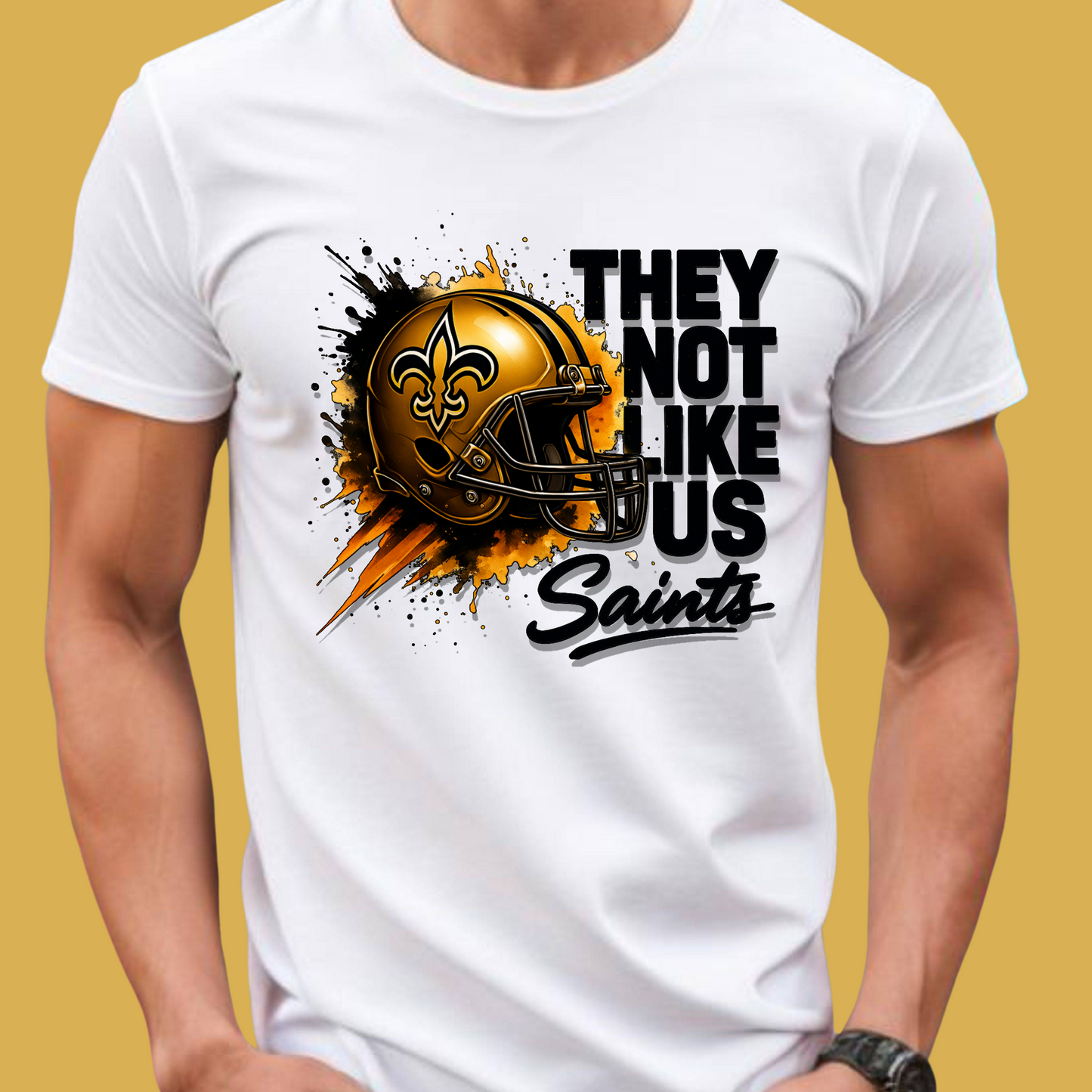White t-shirt with a football helmet graphic and text on a yellow background Saints Mascot Shirt - Ultimate Saints Fan They Not Like Us Tee