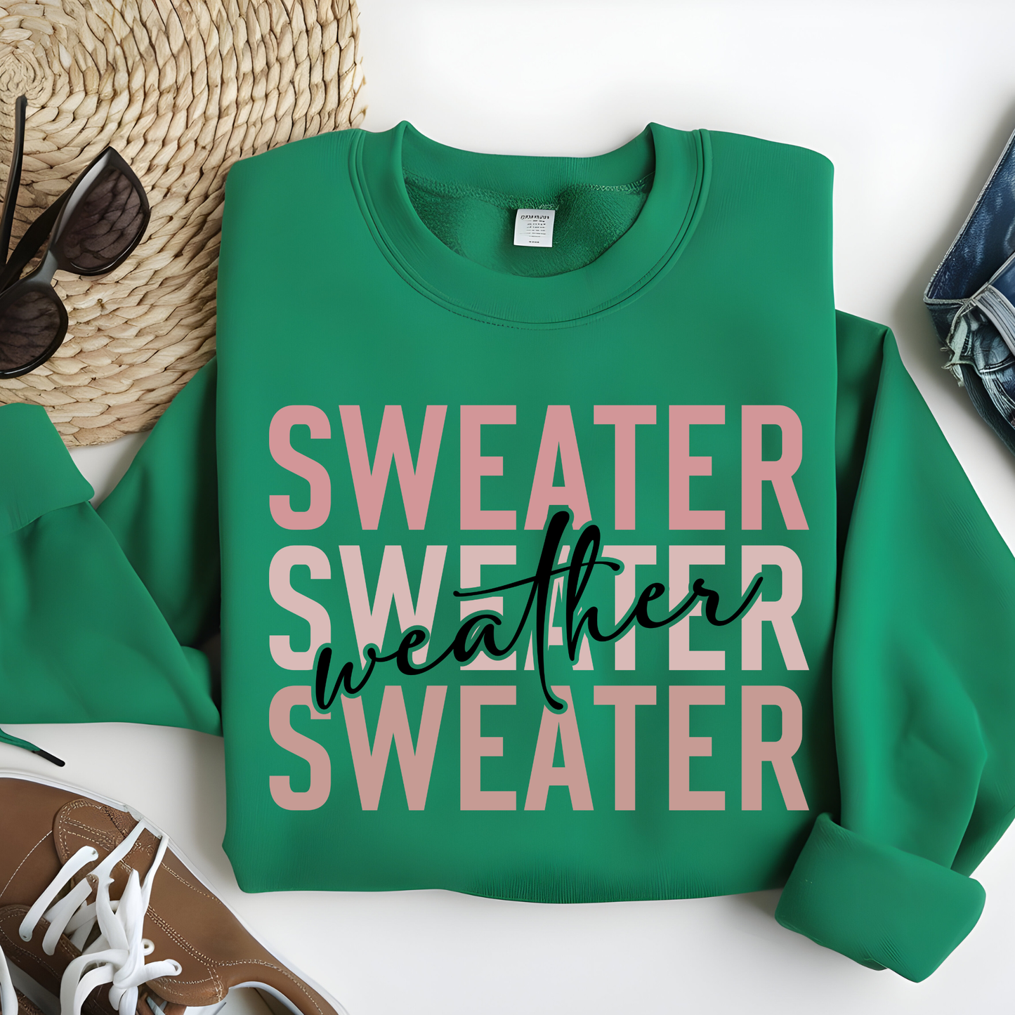 Green sweatshirt with 'SWEATER WEATHER SWEATER' text on a white background Sweater Weather - Cute and Chic Minimalist Fall Crewneck Cozy Sweater