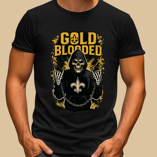 Black t-shirt with 'Gold Blooded' graphic design featuring a skull and crossbones on a beige background. Saints Football Shirt - "Gold Blooded" Saints Game Day Graphic tee