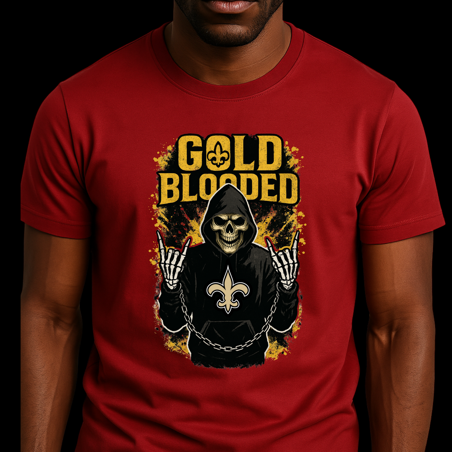 Red t-shirt with a graphic design featuring a skeleton in a hoodie and 'Gold Blooded' text. Saints Football Shirt - "Gold Blooded" Saints Game Day Graphic tee