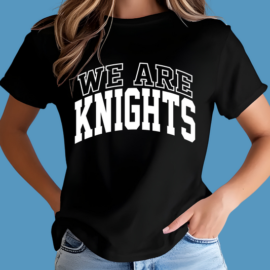 Person wearing a black t-shirt with 'WE ARE KNIGHTS' text on a blue background Knights School Spirit Shirt - We Are Knights - Rep the Knights Tee