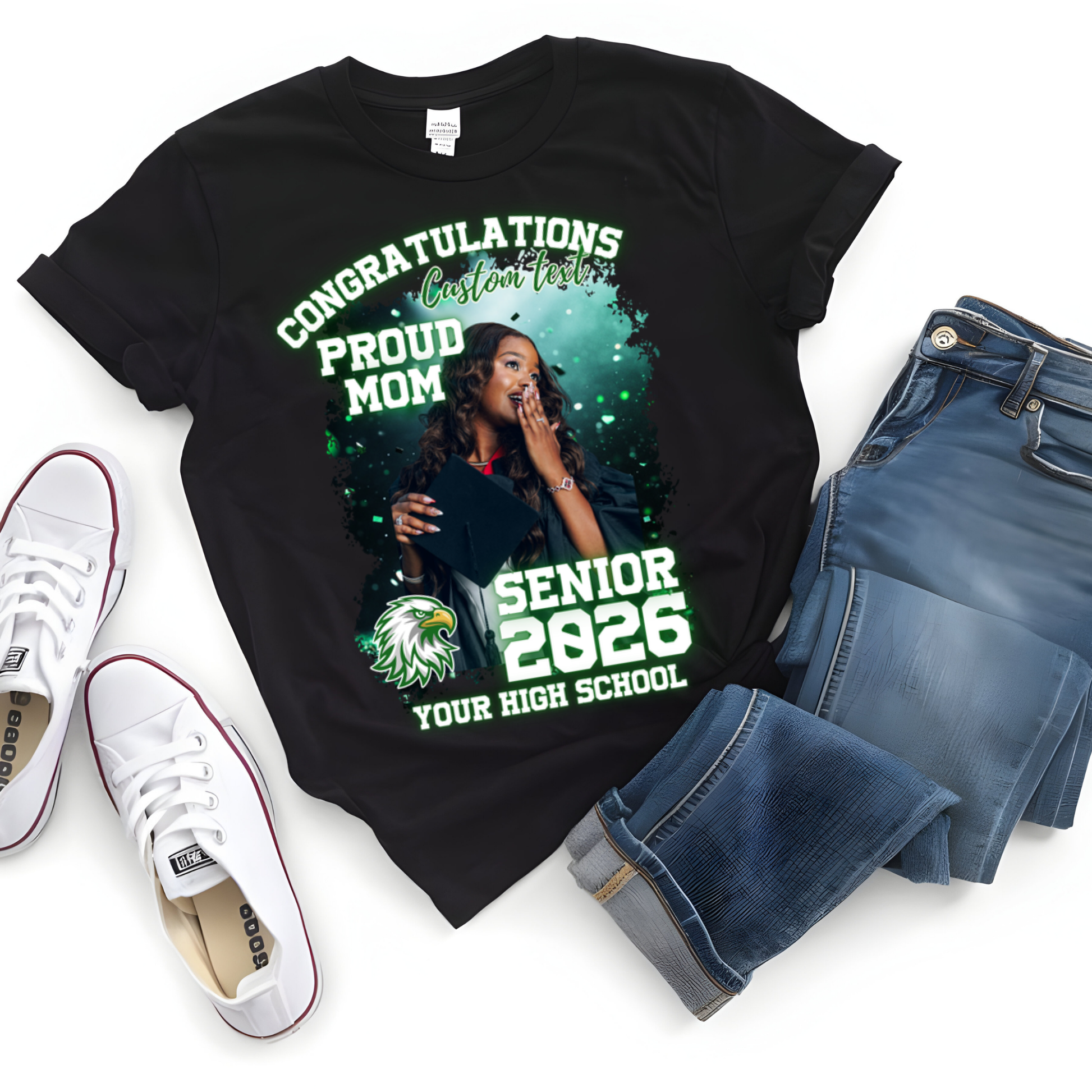 Black t-shirt with personalized design, jeans, and white sneakers on a white background