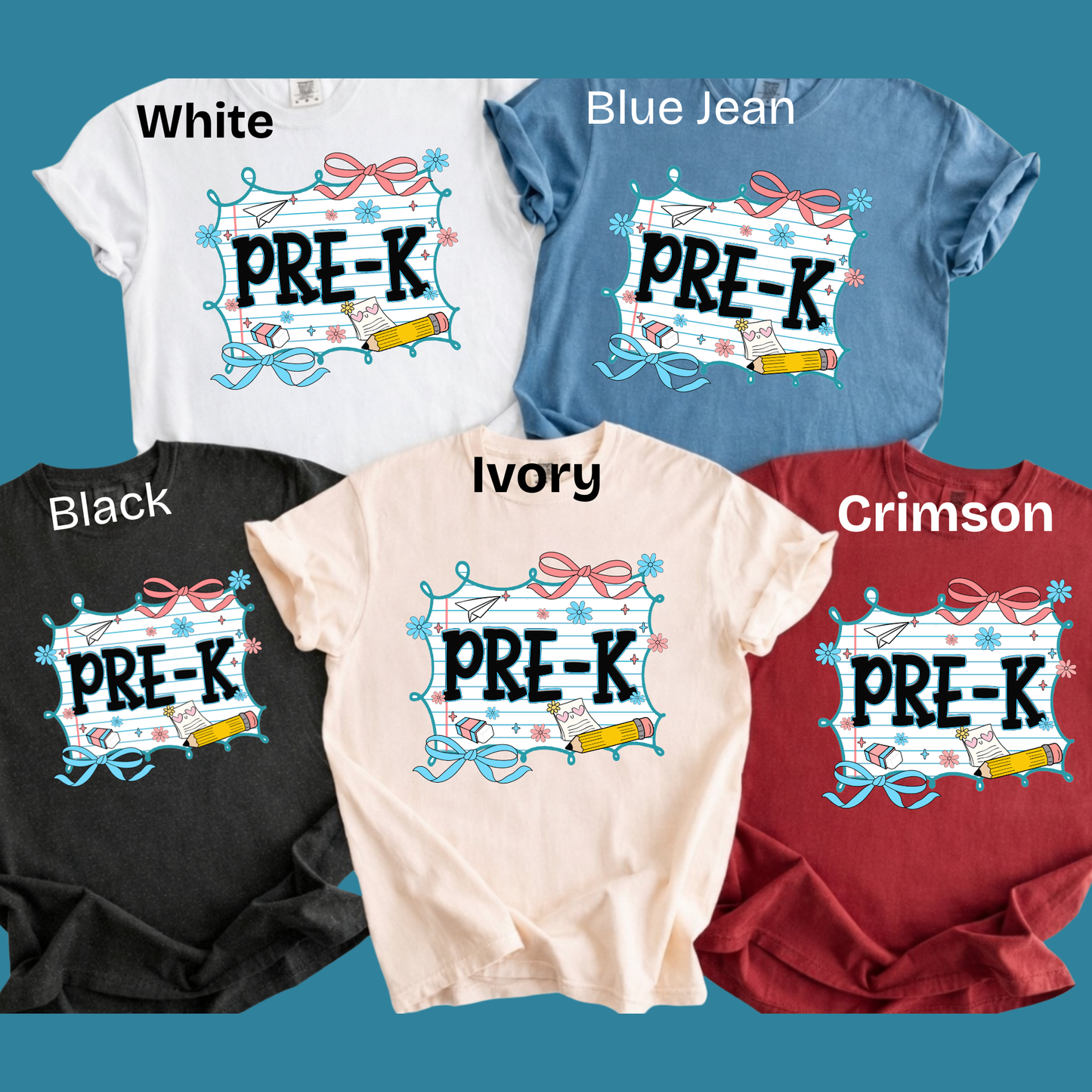Five short-sleeve T-shirts in different colors are arranged on a teal background, each labeled with a color name: White, Blue Jean, Black, Ivory, and Crimson. Each shirt features a large front graphic with the text 'PRE-K' in black outlined letters inside a decorative white banner with pink bows, blue ribbon, and school-themed illustrations.