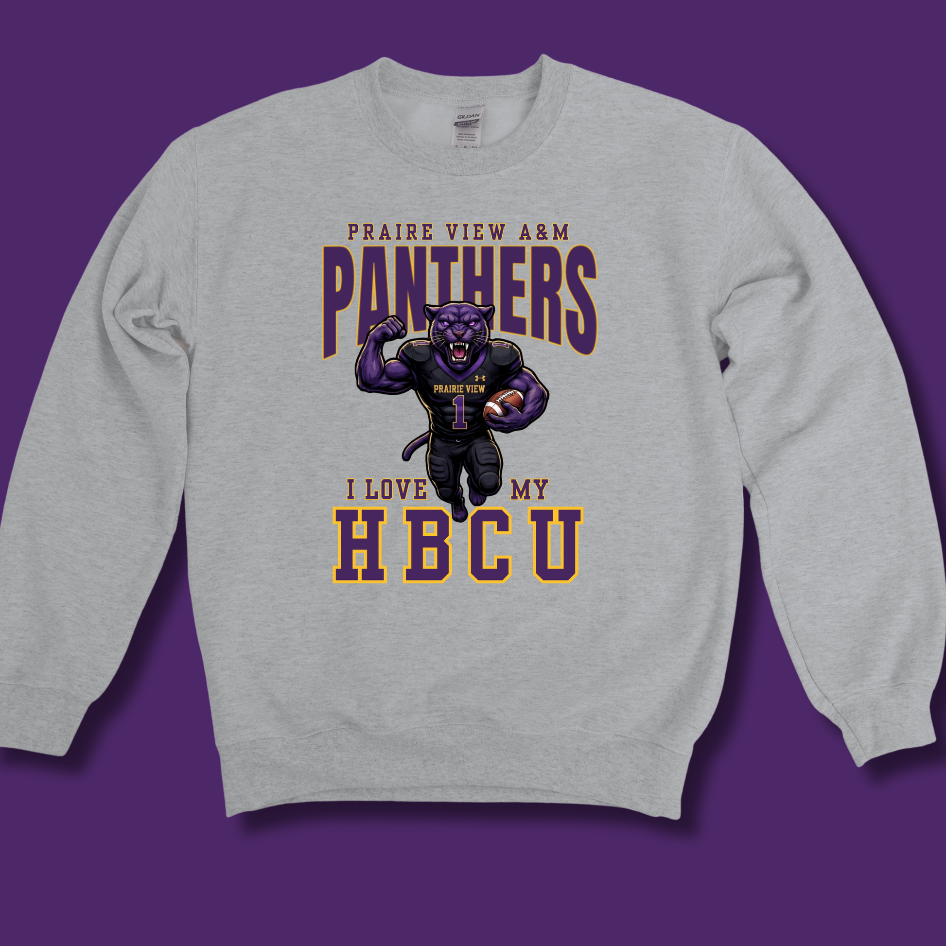A light heather gray crewneck sweatshirt featuring a purple and gold graphic of a running panther mascot with the text 'PRAIRIE VIEW A&M PANTHERS I LOVE MY HBCU'.