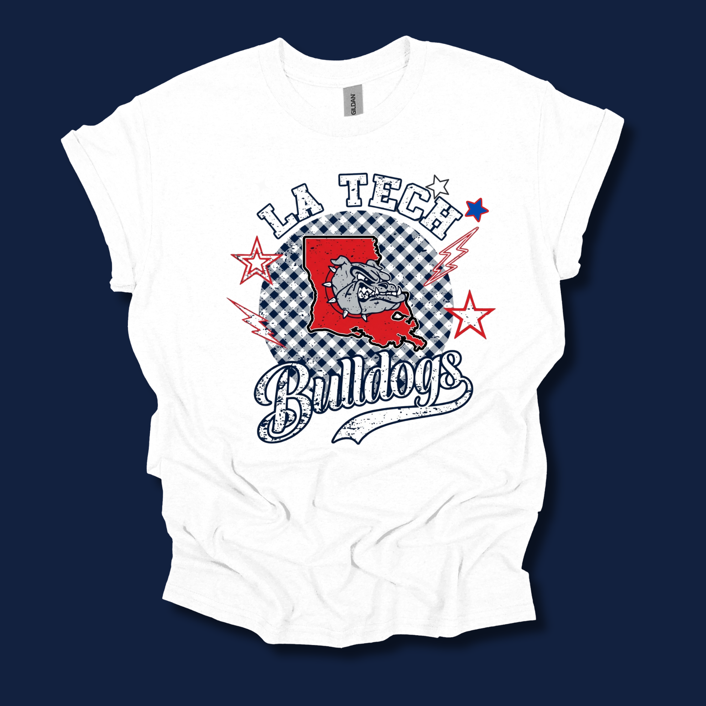 A white short-sleeve graphic t-shirt featuring the 'LA Tech Bulldogs' design on the front, displayed against a solid dark navy blue background.
