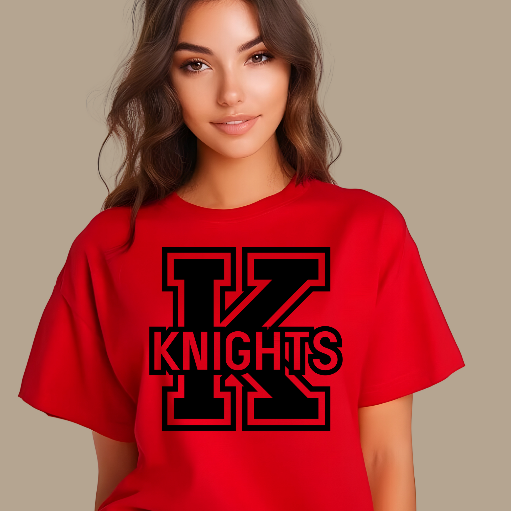 Person wearing a red t-shirt with 'K KNIGHTS' design on a beige  Knights School Spirit Shirt - Knights Logo: Loud & Proud Knights background