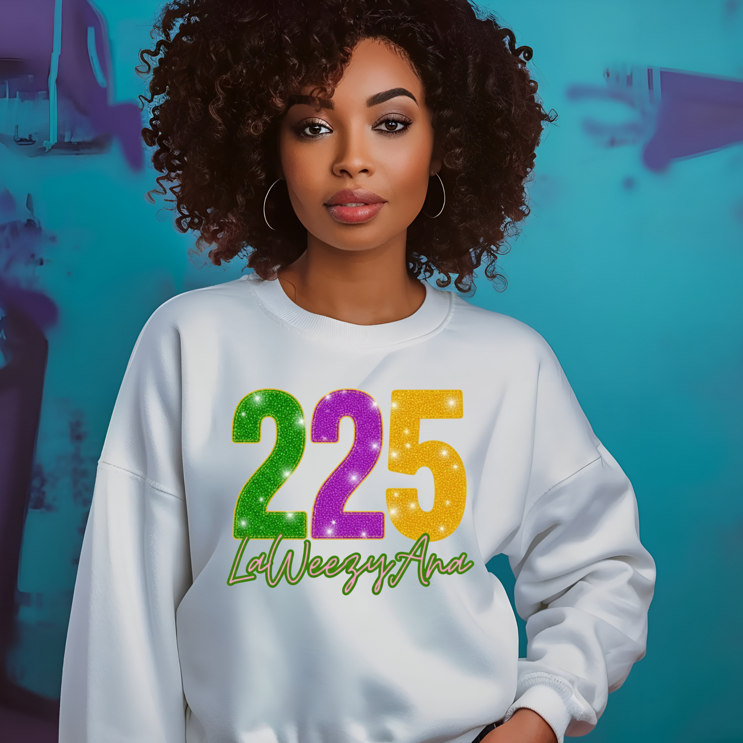 Woman wearing a white sweatshirt with colorful numbers and text against a blue background