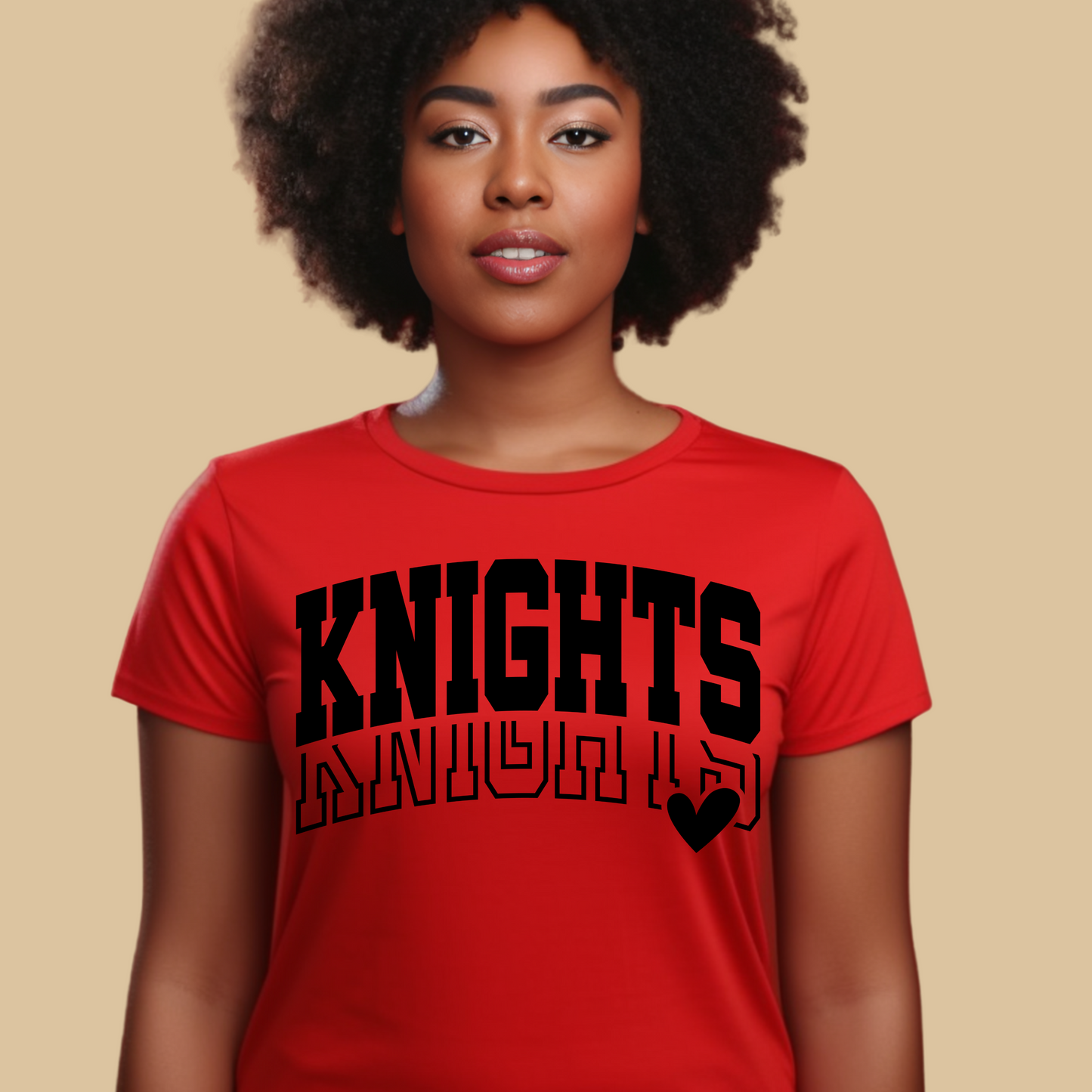 Person wearing a red t-shirt with 'KNIGHTS' printed on it against a beige background Knights School Spirit Shirt - Knights Varsity - Knights Spirit Tee