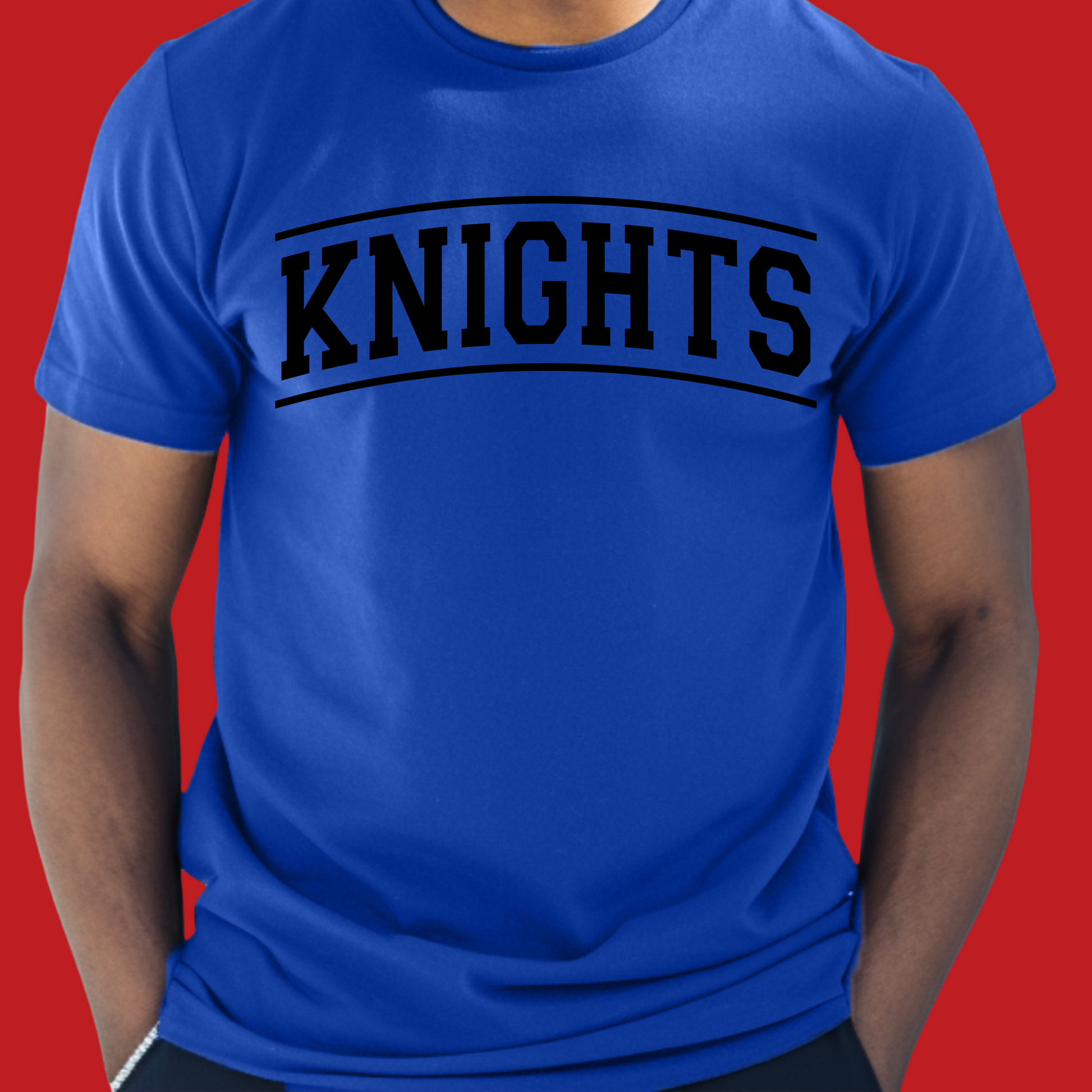 Person wearing a blue t-shirt with 'KNIGHTS' printed on it against a red background Knights School Spirit Shirt - Knights Fan Merch - School Pride Graphic T-Shirt