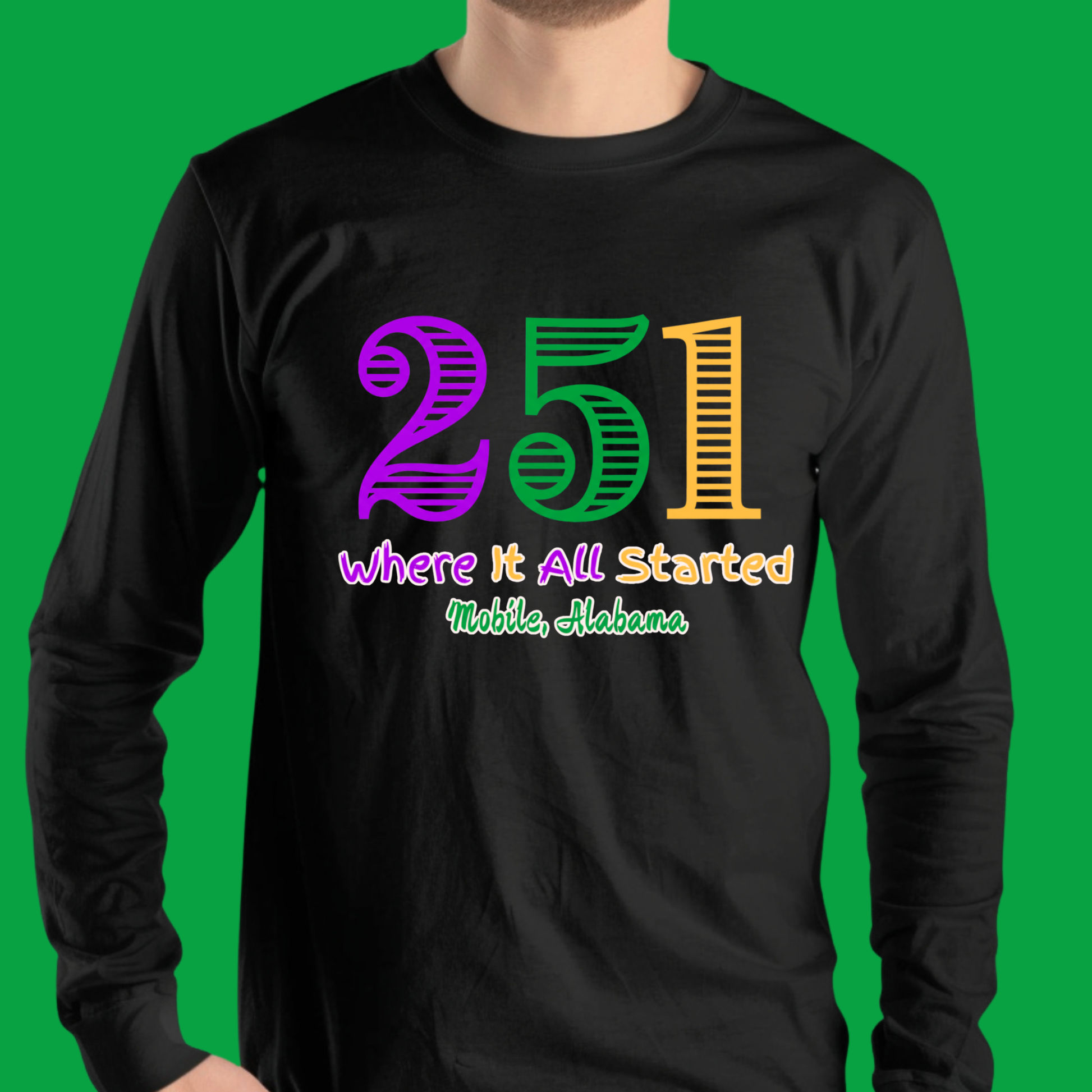 Black long-sleeve shirt with colorful text on a green background