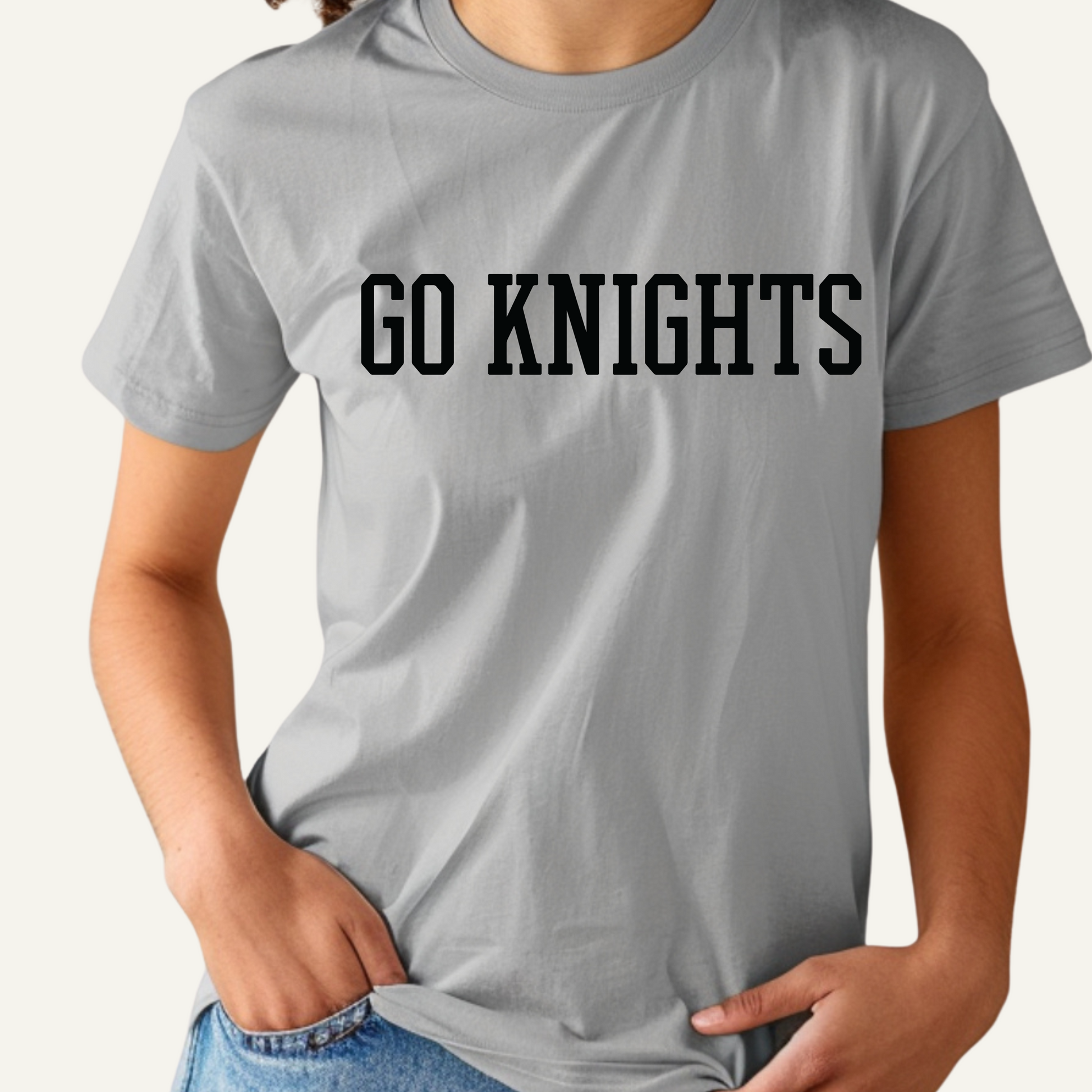Gray t-shirt with 'GO KNIGHTS' text worn by a person on a light gray background Knights School Spirit Shirt - Go Knights - School Pride T-Shirt