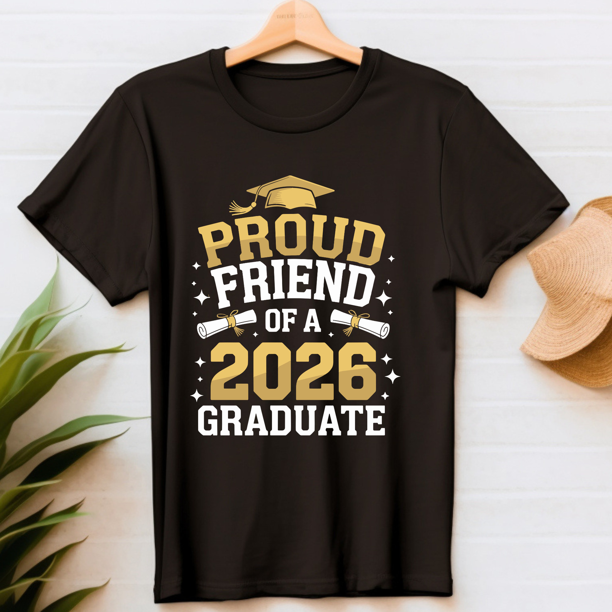 Black t-shirt with 'Proud Friend of a 2026 Graduate' text on a white background