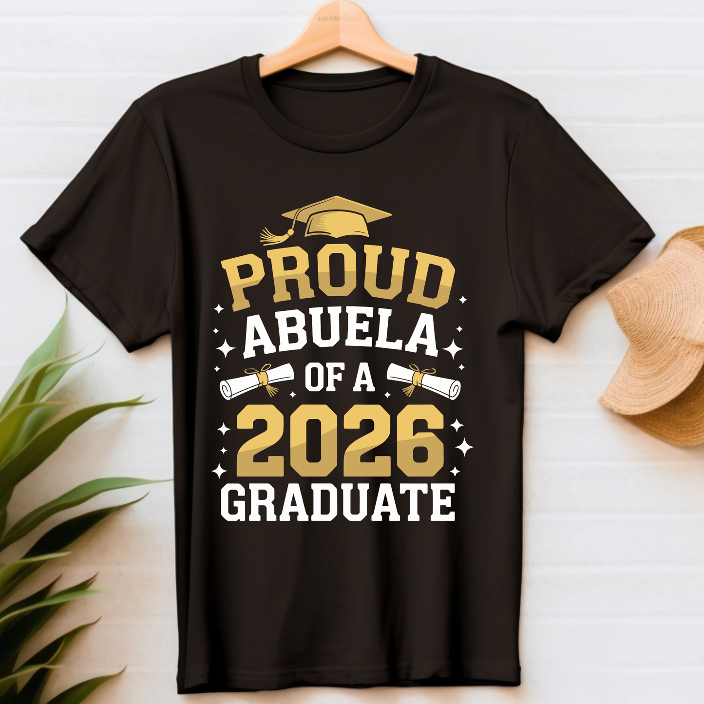 Black t-shirt with 'Proud Abuela of a 2026 Graduate' text on a white background
