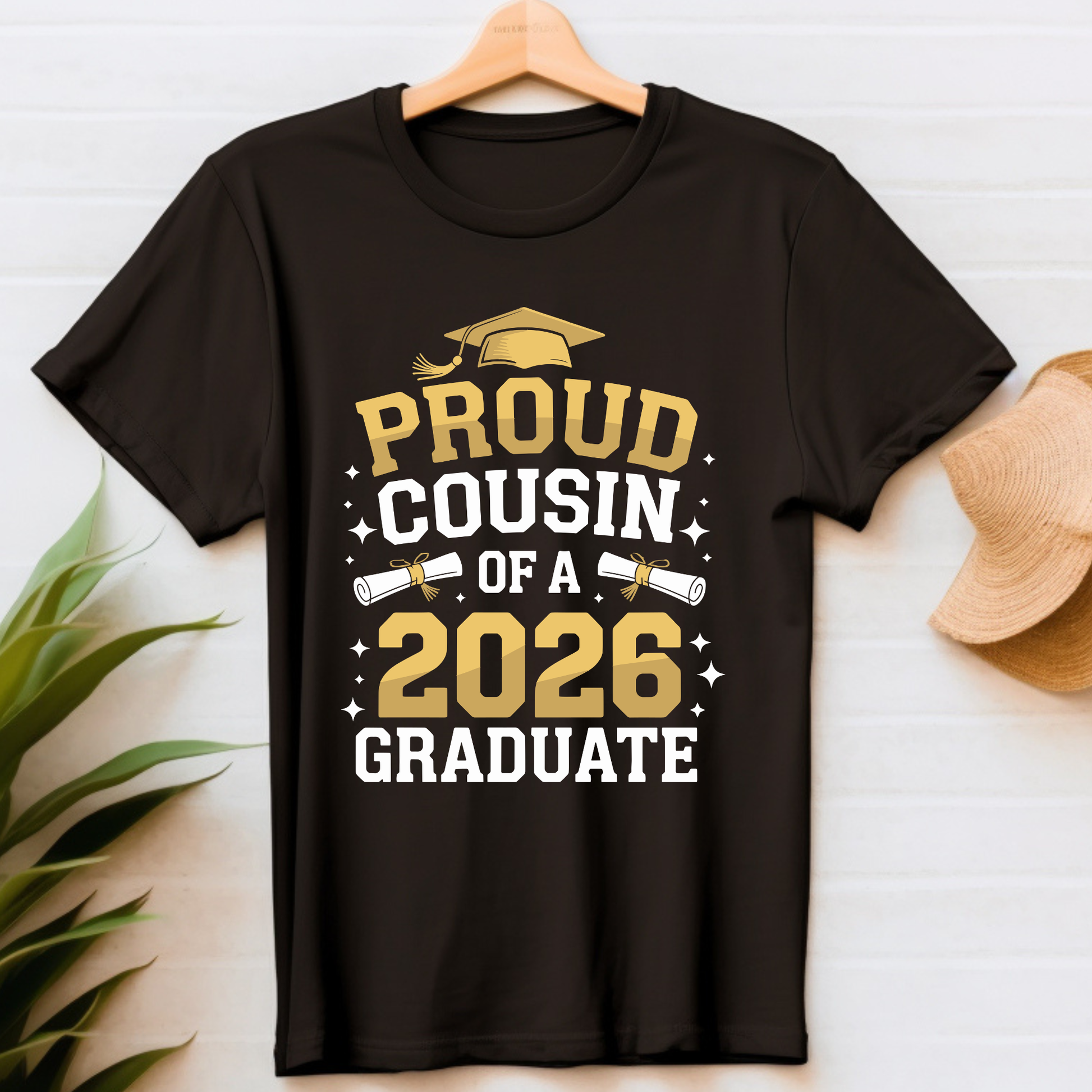 Black t-shirt with 'Proud Cousin of a 2026 Graduate' text on a white background