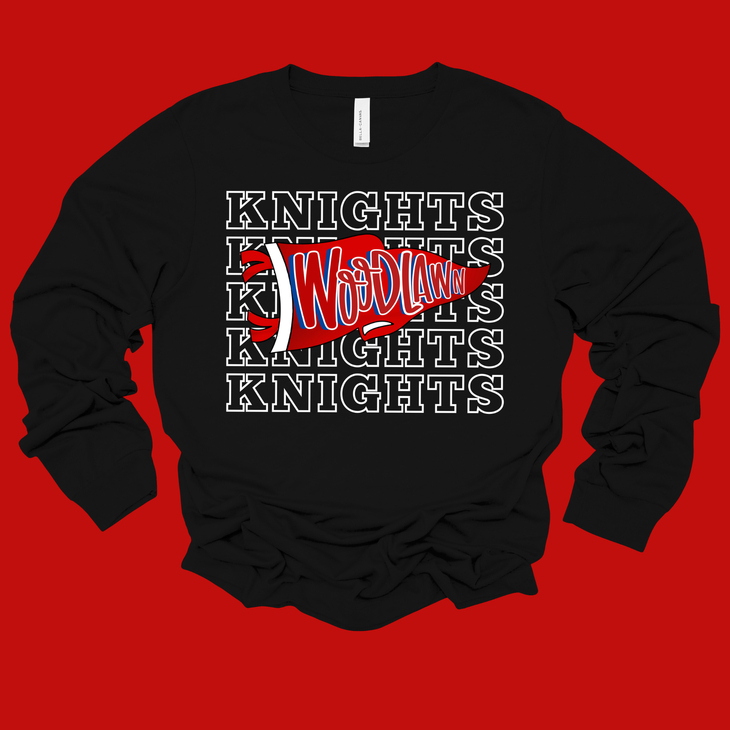 A black long-sleeve t-shirt with a graphic design on the front, featuring the word 'Knights' repeated in white outline text, overlaid with a red and white diagonal banner that reads 'We'll Win'. The shirt is displayed flat against a solid red background.