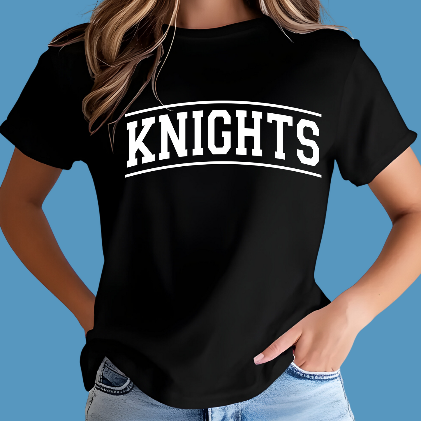 Person wearing a black t-shirt with 'KNIGHTS' printed on it against a blue background Knights School Spirit Shirt - Knights Fan Merch - School Pride Graphic T-Shirt