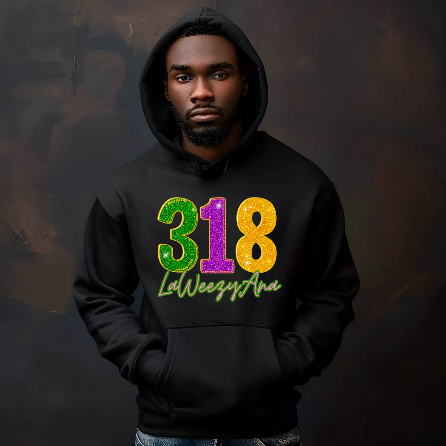 Person wearing a black hoodie with colorful text on a dark background