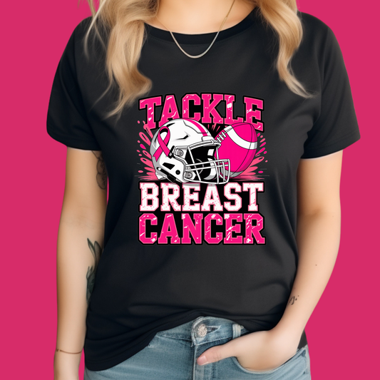 Person wearing a black t-shirt with 'Tackle Breast Cancer' design on a pink background Pink Ribbon Tee: Tackle Breast Cancer Support Football T-Shirt