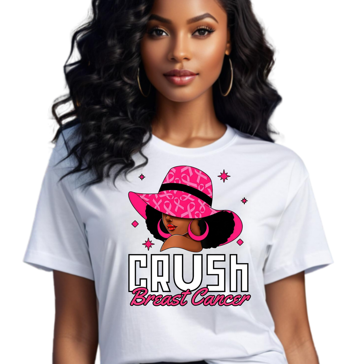 A woman wearing a white graphic T-shirt with a pink and black illustration of a woman in a pink hat and the text 'CRUSH Breast Cancer'.