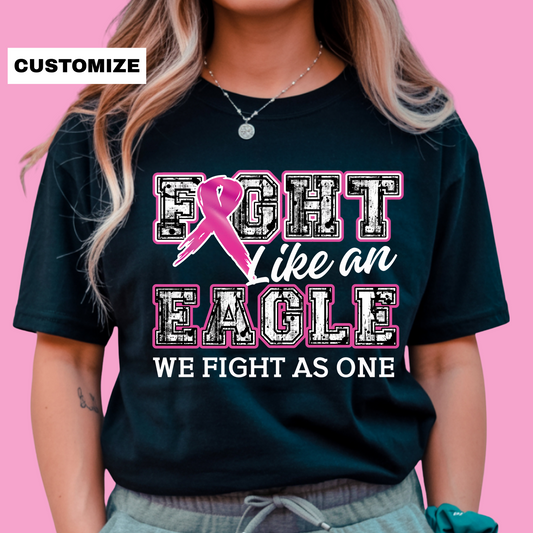 Person wearing a black t-shirt with a pink ribbon design and text on a pink background Custom Mascot T-Shirt: Fight Like a "Mascot" - Game Day Breast Cancer Support Tee