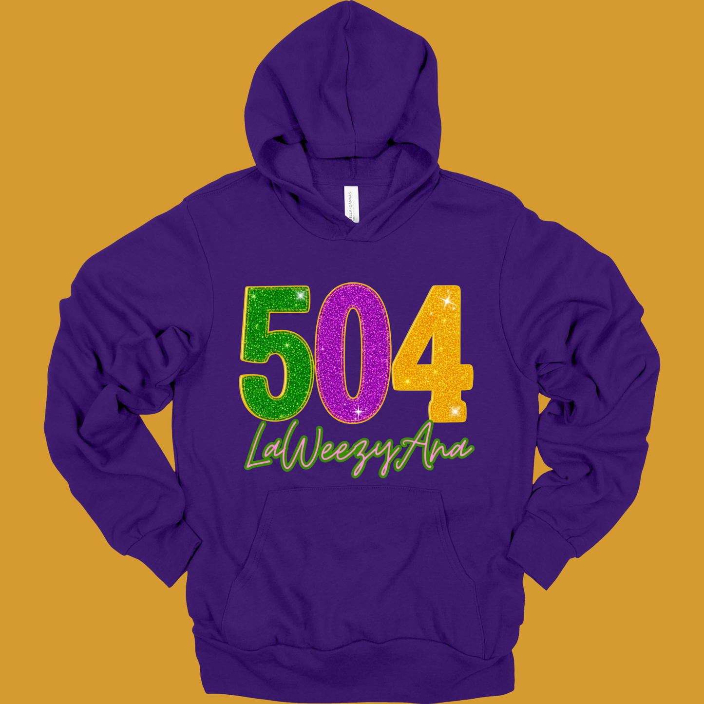 Purple hoodie with colorful numbers and text on a mustard yellow background