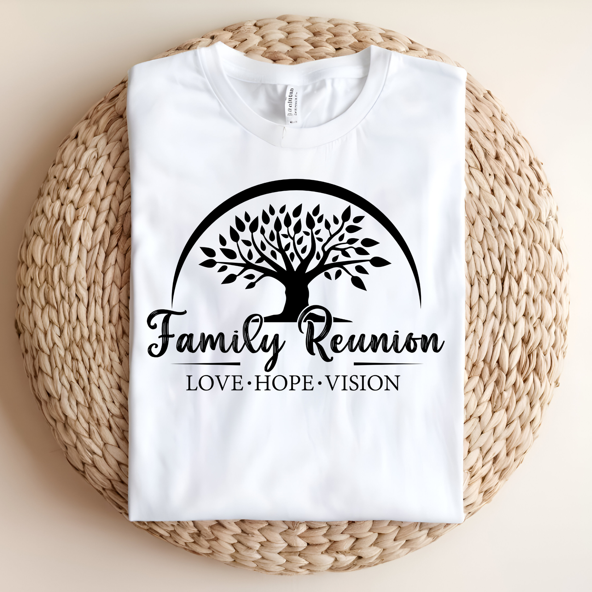 White t-shirt with 'Family Reunion' design on a woven mat